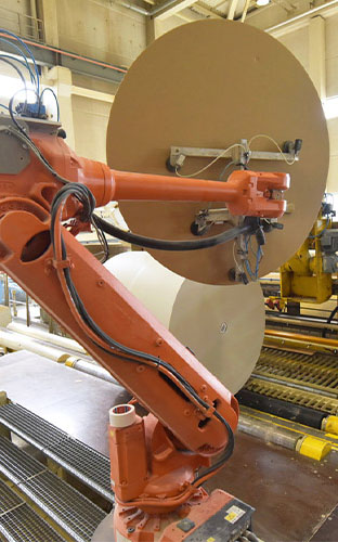 Mechanical arm in pulp and paper facility